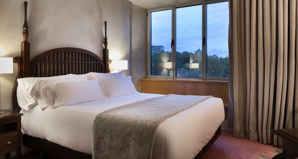 Nh Collection Madrid Paseo Del Prado Hotel Exterior foto A bedroom at the hotel