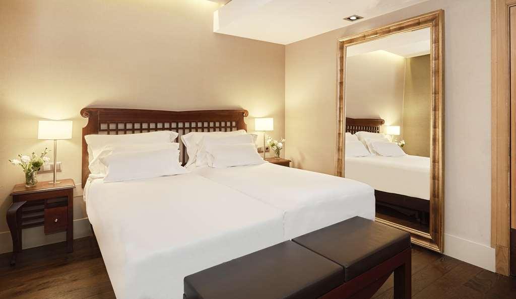 Nh Collection Madrid Paseo Del Prado Hotel Exterior foto A bedroom at the hotel