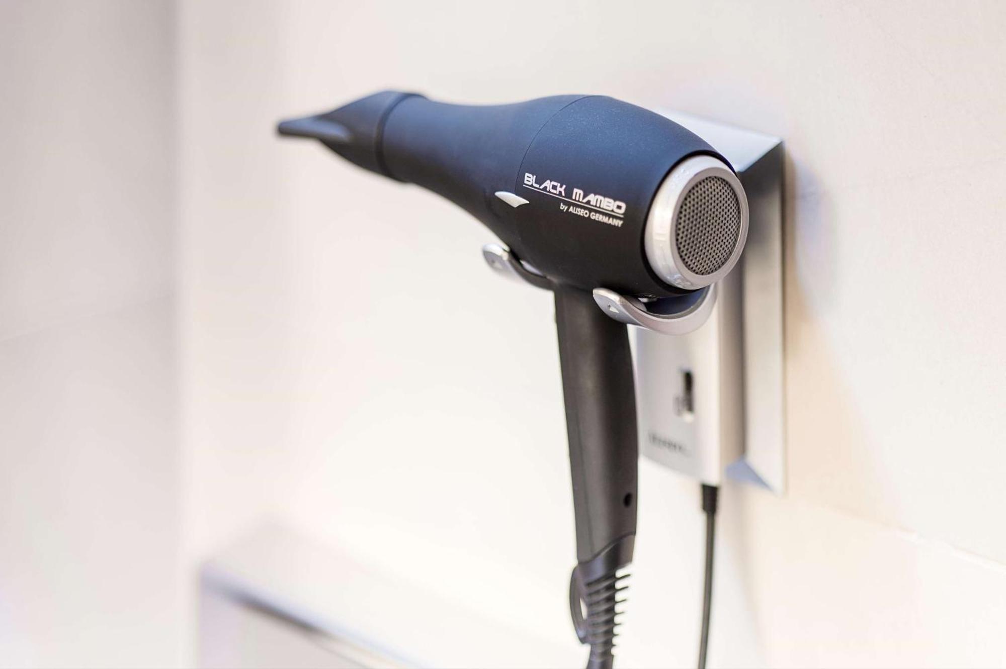 Nh Collection Madrid Paseo Del Prado Hotel Exterior foto A hair dryer