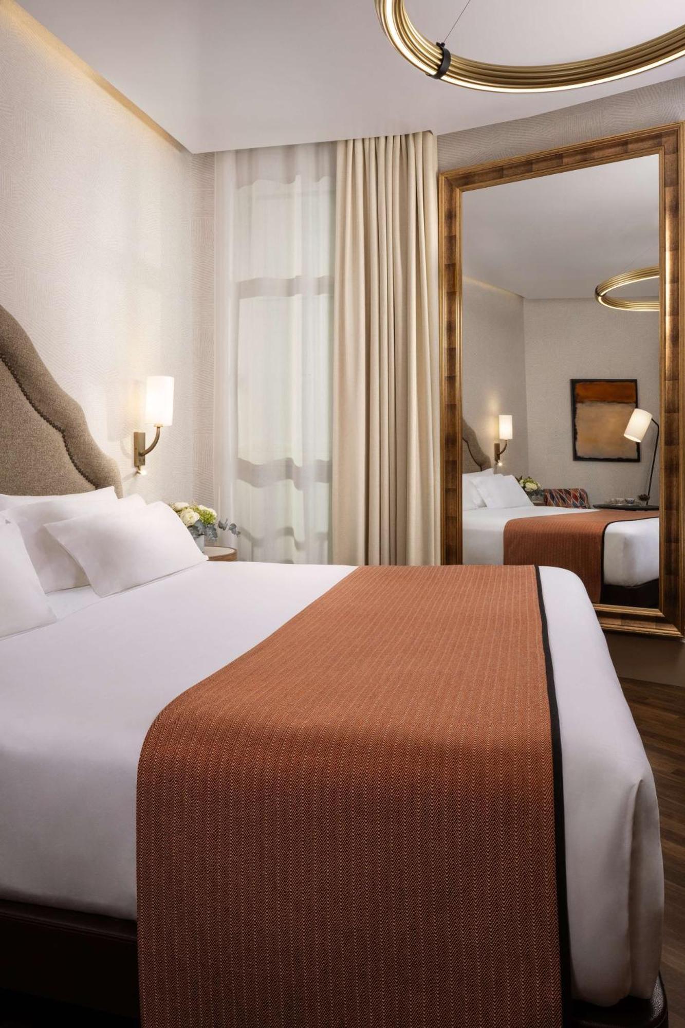 Nh Collection Madrid Paseo Del Prado Hotel Exterior foto A bedroom at the hotel